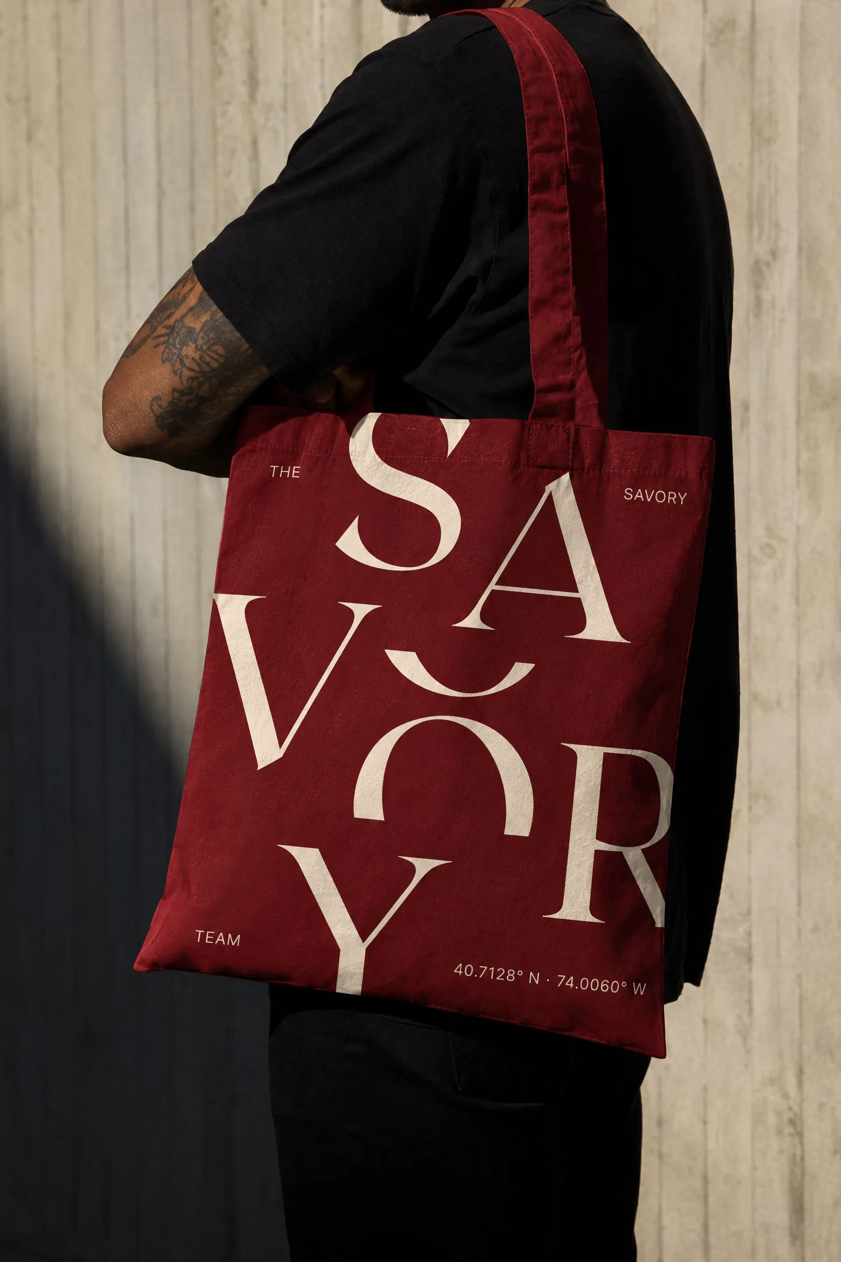 Wax red tote bag with SAVORY stacked in light capitals and New York coordinates
