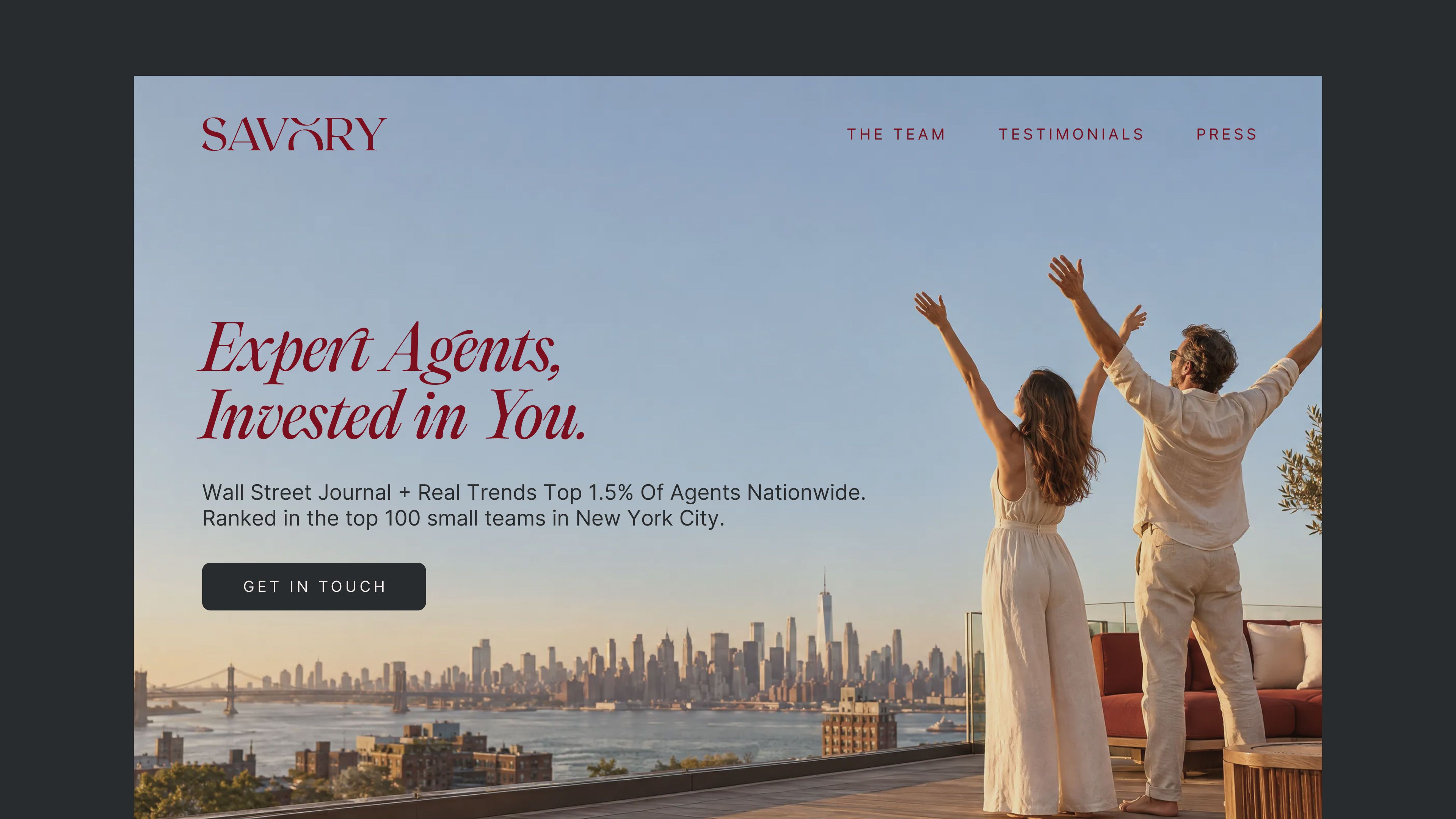 The Savory Team website design with Expert Agents, Invested in You in wax red over the New York skyline, beside a couple raising their arms on a rooftop terrace